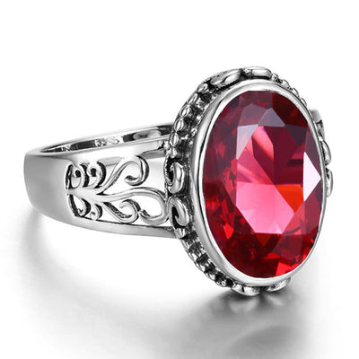 Chevalière pour femme argent pierre grenat côtés parementés