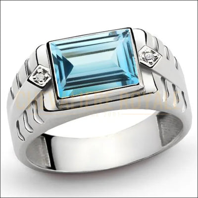 Chevalière argent composée de topaze bleue et de 2 diamants