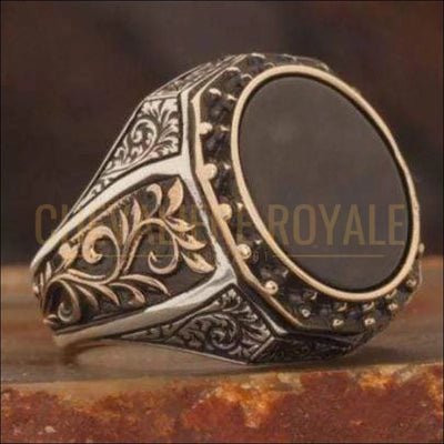 Chevalière argent homme mettant en vedette une pierre onyx