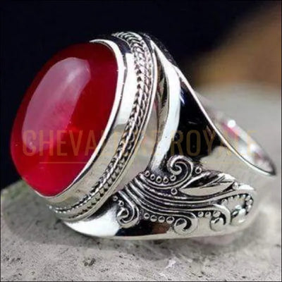 Chevalière femme argent la pierre rubis jolis motifs exubérants