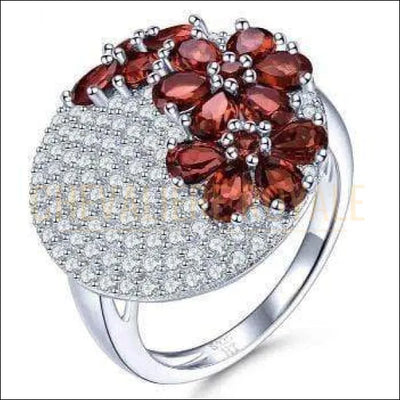 Chevaliere Royale - bague  femme en argent grenats trônent en forme de fleurs