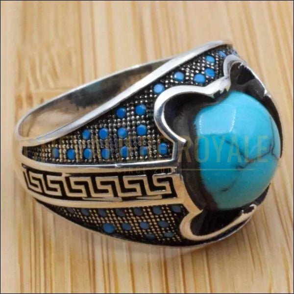 Chevalière homme argent la vedette de la pièce la pierre turquoise