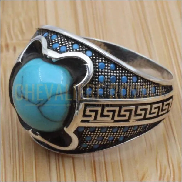 Chevalière pour homme argent la vedette de la pièce la pierre turquoise