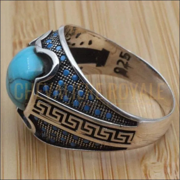 Chevalière homme argent la vedette de la pièce pierre turquoise