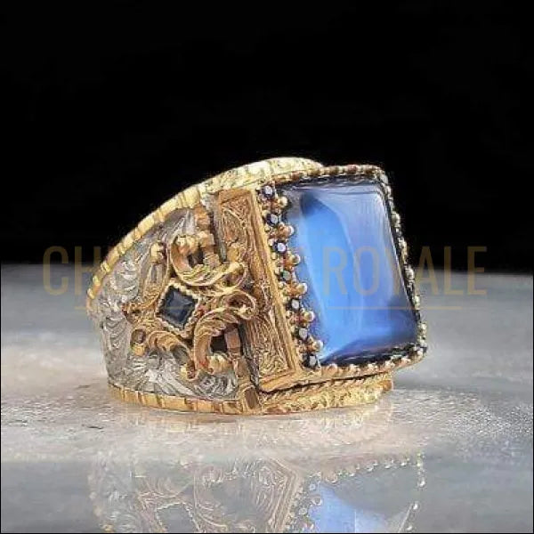 Chevalière homme artisanale en argent touche artistique sérieuse  pierre bleu