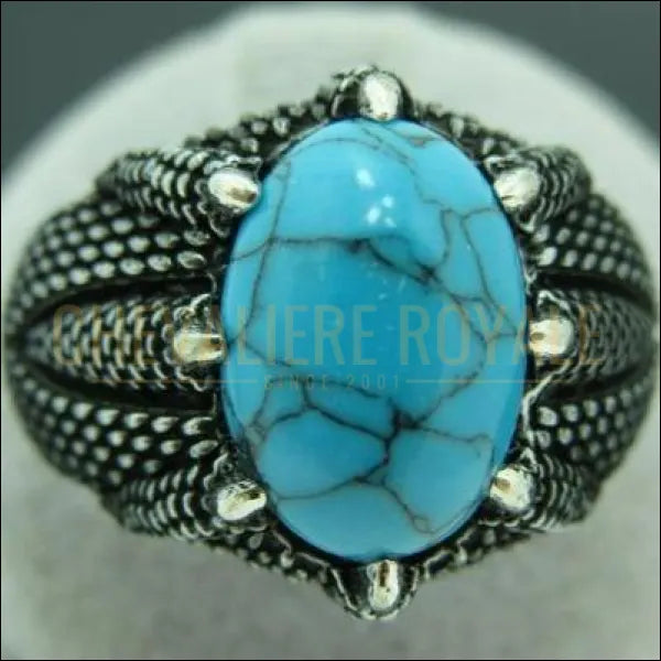 Chevalière homme avec pierre turquoise huit crochés en argent bague