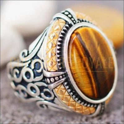 Chevaliere royale homme en argent simple et chic avec pierre oeil de tigre