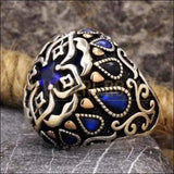 Chevalière homme motif héraldique conception de croix romaine