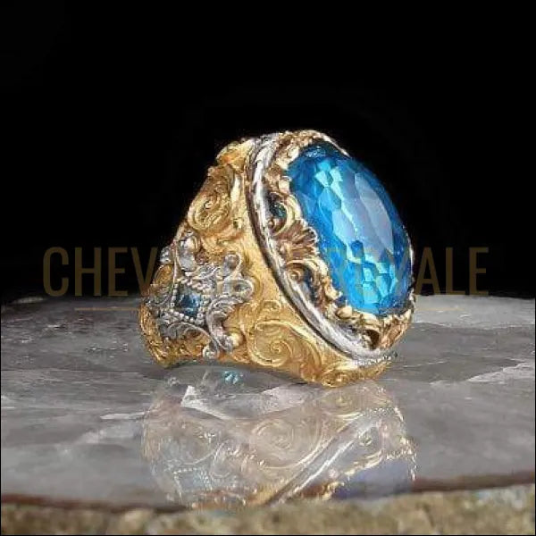 Chevalieres pour homme argent plaqué or pierre grande topaze bleue