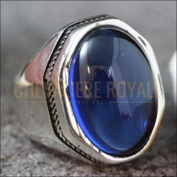 Chevaliere royale sertie d'une pierre saphir bleu pour homme en argent